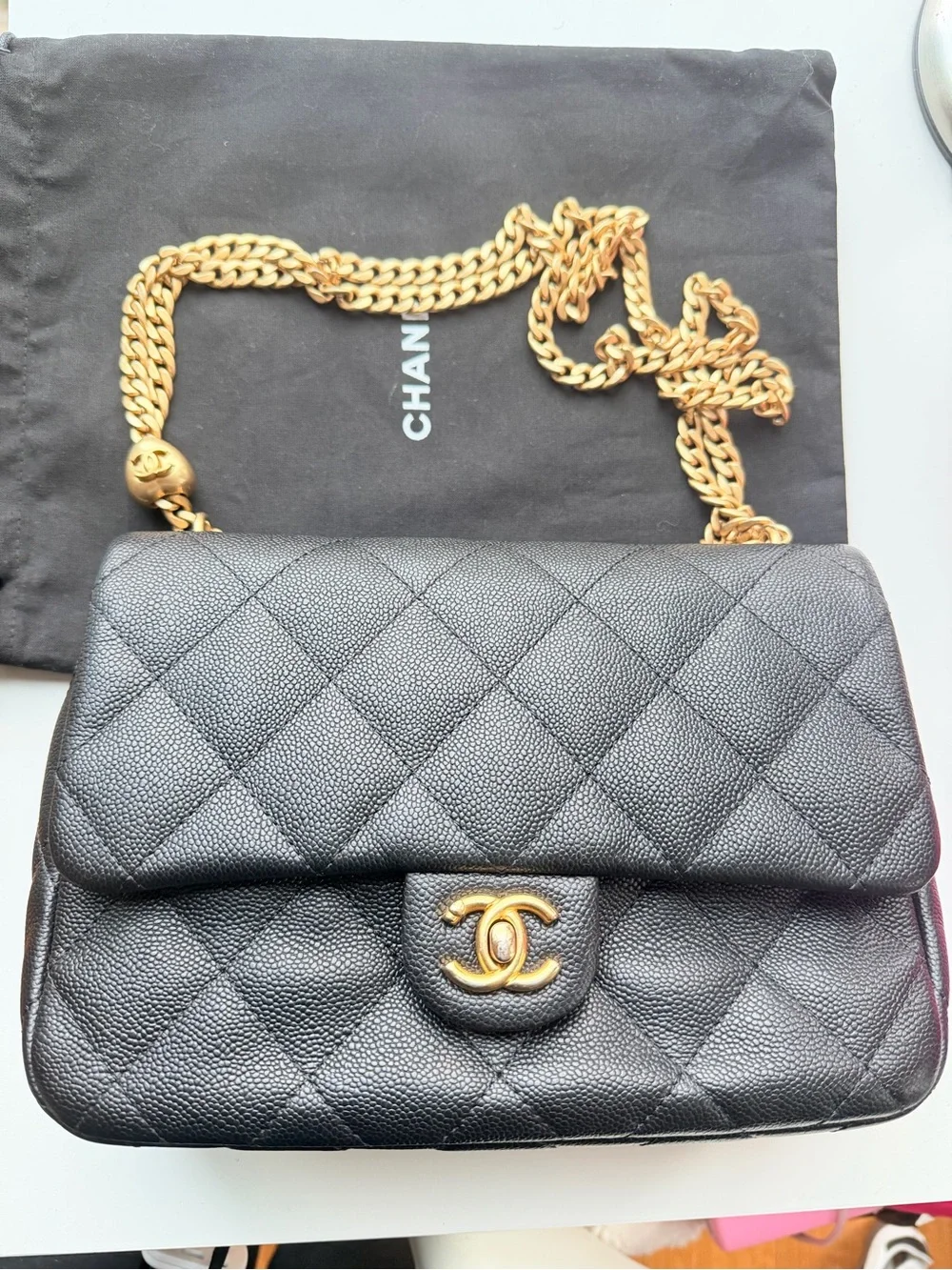CHANEL Black Quilted Shoulder Bag with Gold Hardware